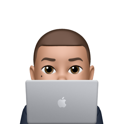 Person peeking from behind laptop